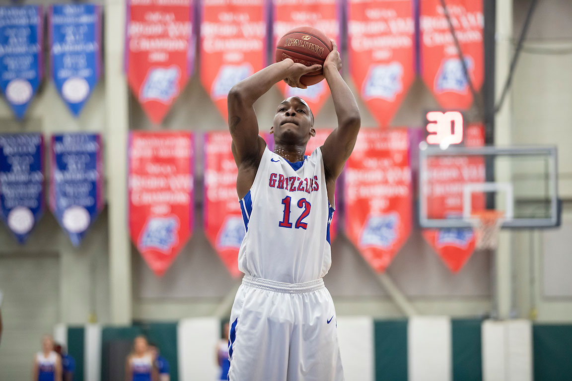 Sophomore forward Burone Edwards aims for the basket during a recent home game.