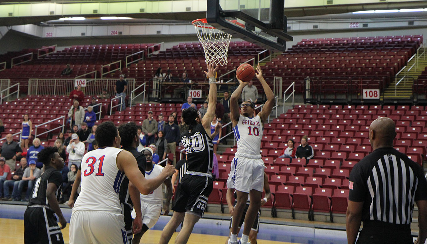 Alex Peterson shoots for 2 of his 21 points during the Grizzlies' game against Nationwide Academy. (Missouri State-West Plains Photo)
