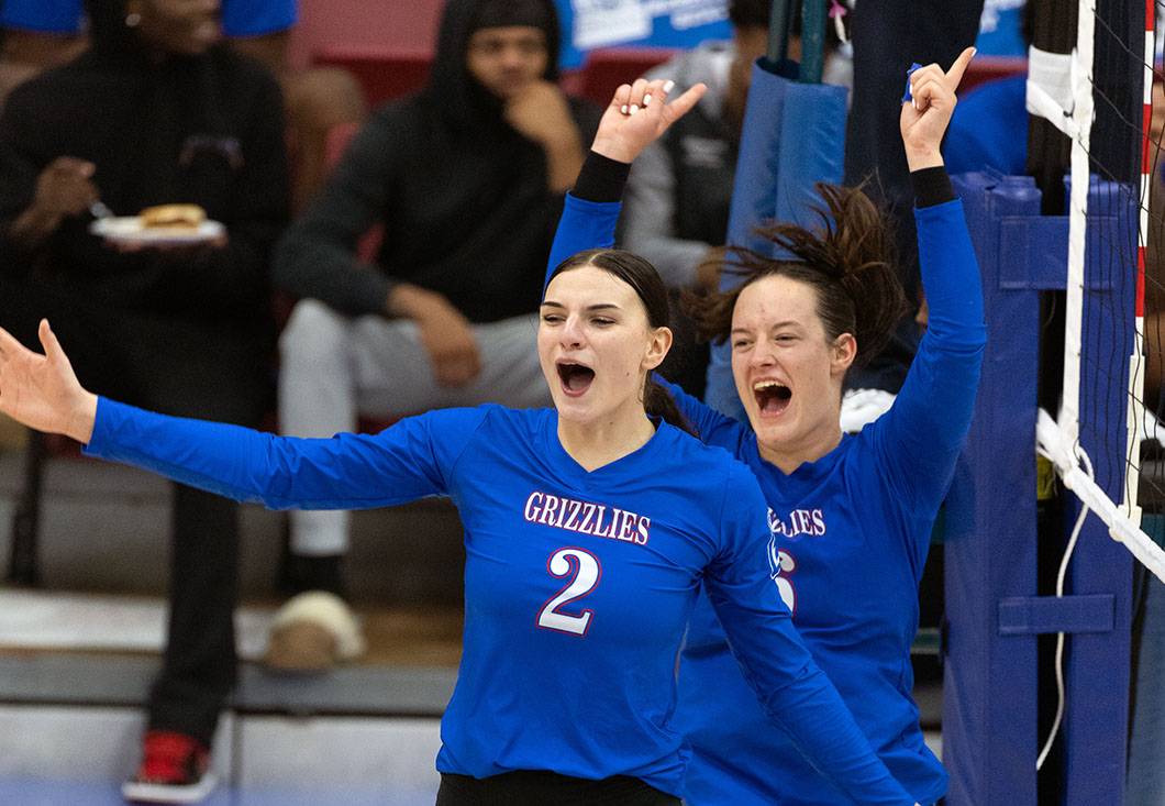 Middle blocker Maja Bochenek (No. 2) and outside hitter Rosa Brencic celebrate a point at a recent home game. Both were named to the Grizzly Invitational all-tournament team. (MSU-WP Photo)